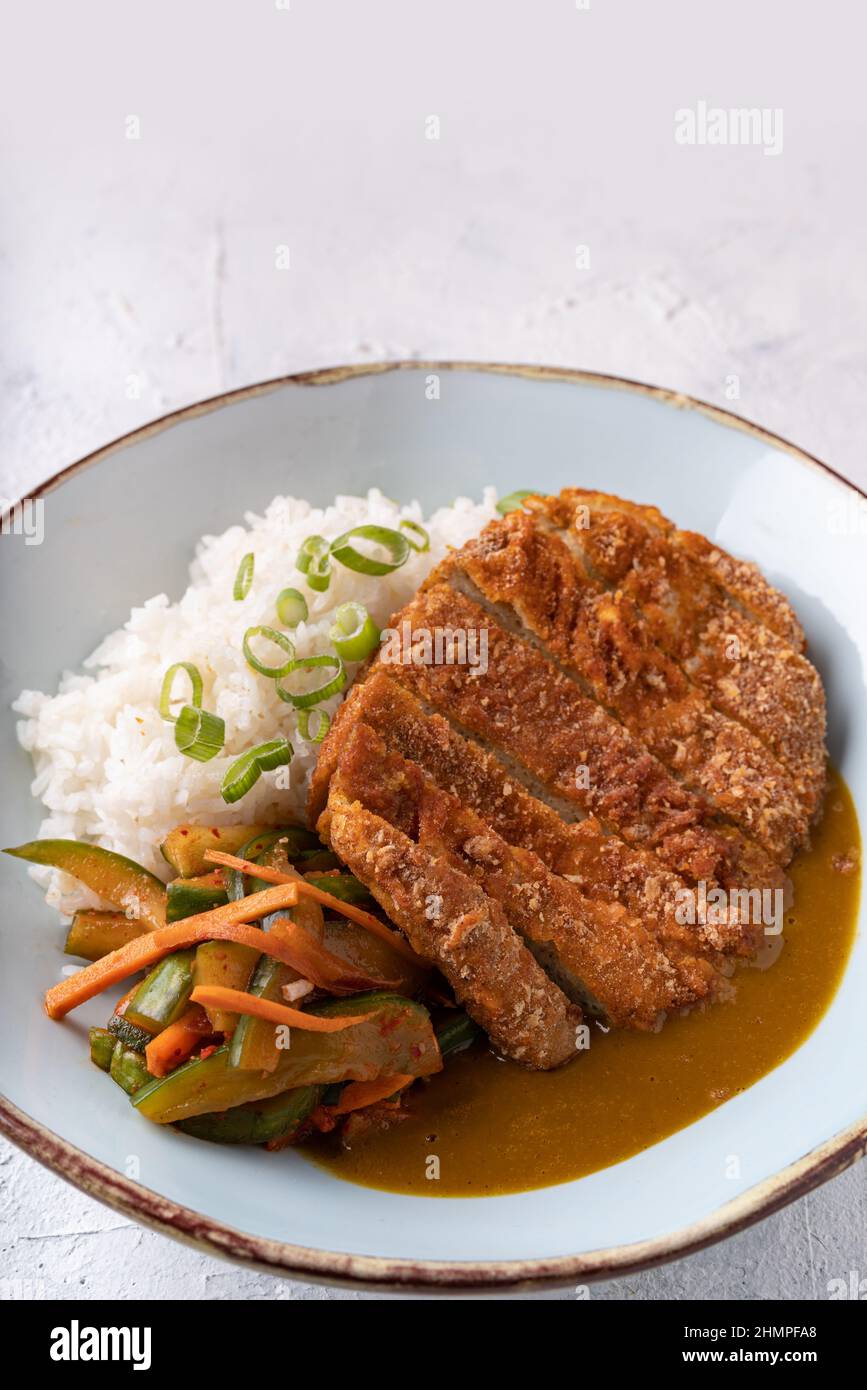 Asian fusion vegan meatfree chickpea steak, garnished with carrot