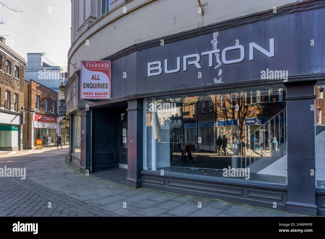 Empty ex Burton premises for sale or to let, in King's Lynn High Street. Stock Photo