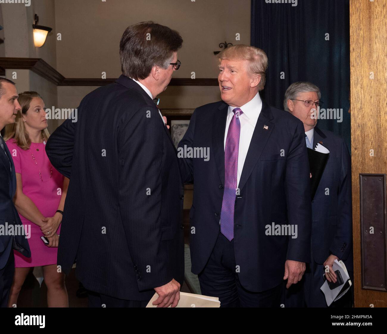 San Antonio,  Texas USA  August 23, 2016: Republican presidential nominee DONALD TRUMP brings his unconventional campaign to Texas with a swing through mostly Democratic central Texas with fund raisers and a rally. Here he converses backstage with Lt. Gov. DAN PATRICK, who heads up his Texas campaign. ©Bob Daemmrich Stock Photo