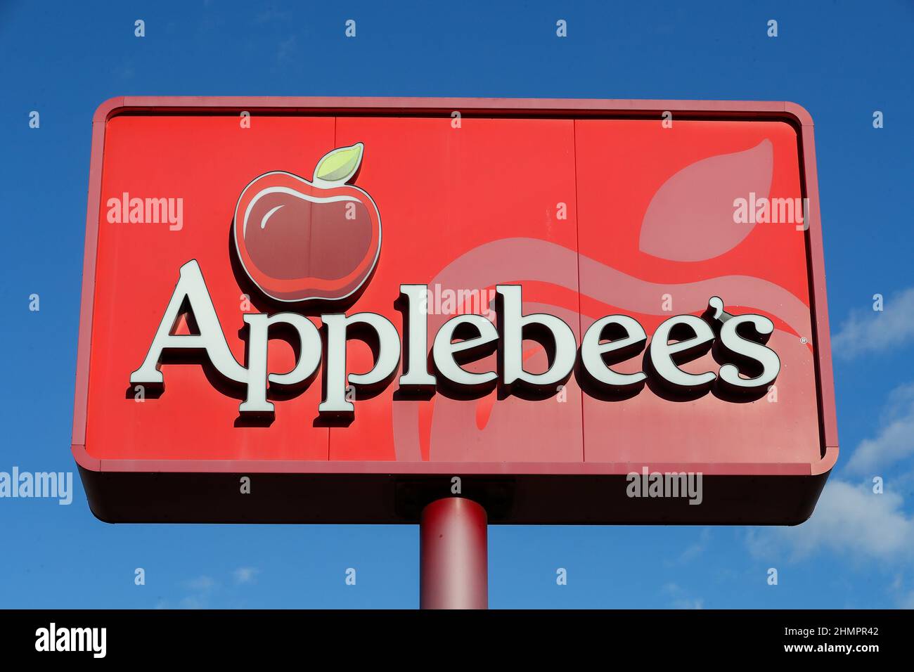 A view of an Applebee's restaurant sign and logo.Exterior views, signs