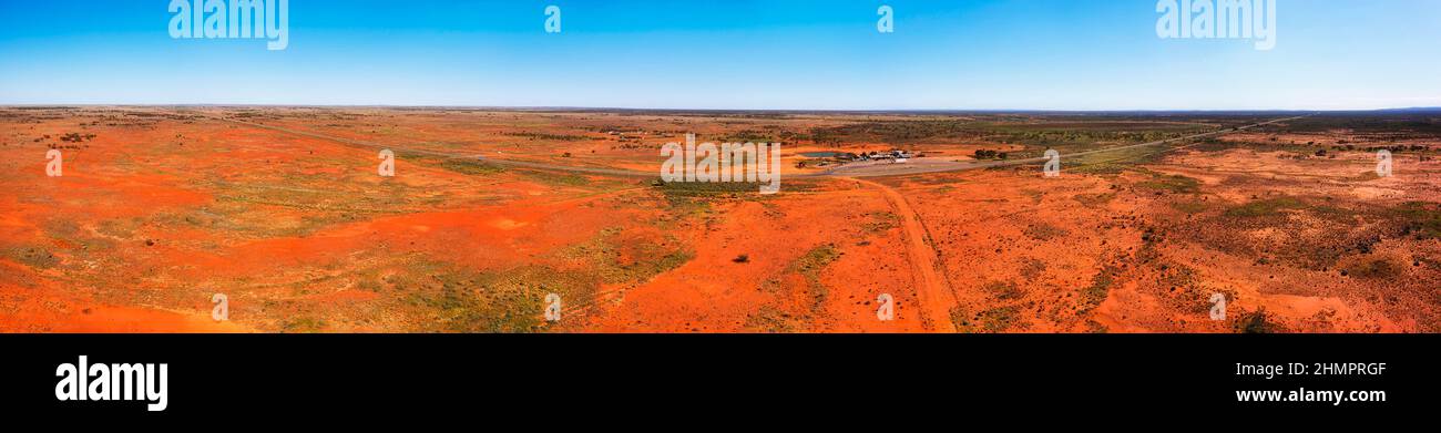 Little topar roadhouse rest area stop over on Barrier highway near Broken hill city of Australian outback - wide aerial panorama. Stock Photo