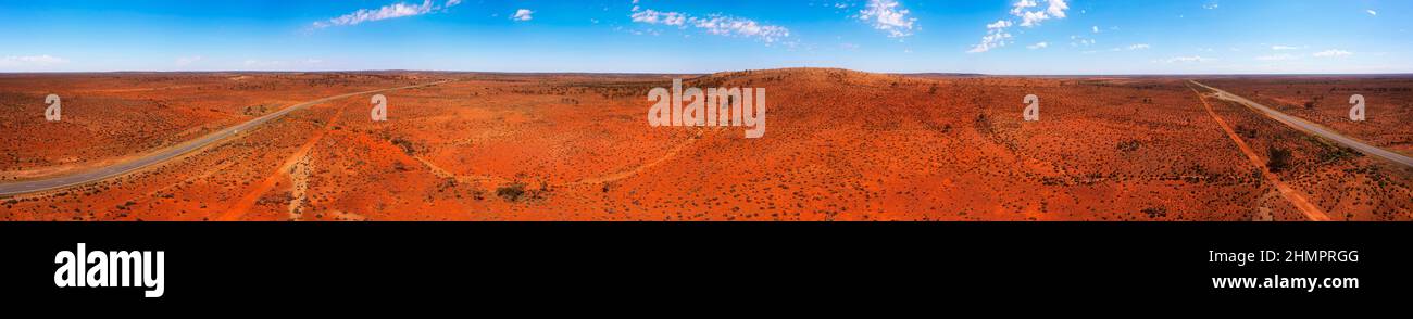 Endless red soil outback of Australia along Barrier highway from Broken hill at Dolo hill rest stop. Stock Photo