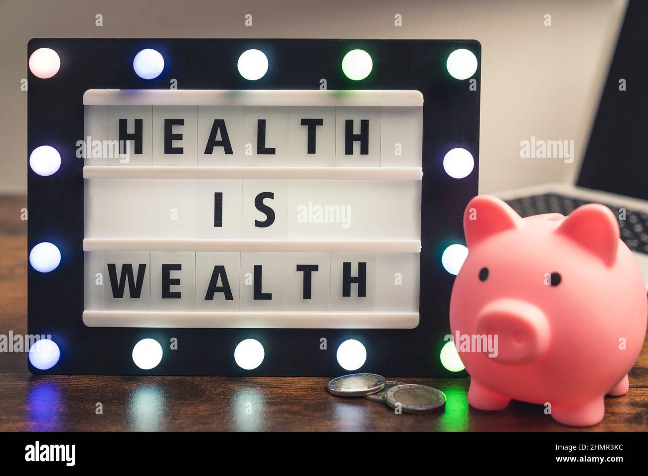 Health is Wealth phrase spelled on marquee lightbox - savings in medical care concept. High quality photo Stock Photo