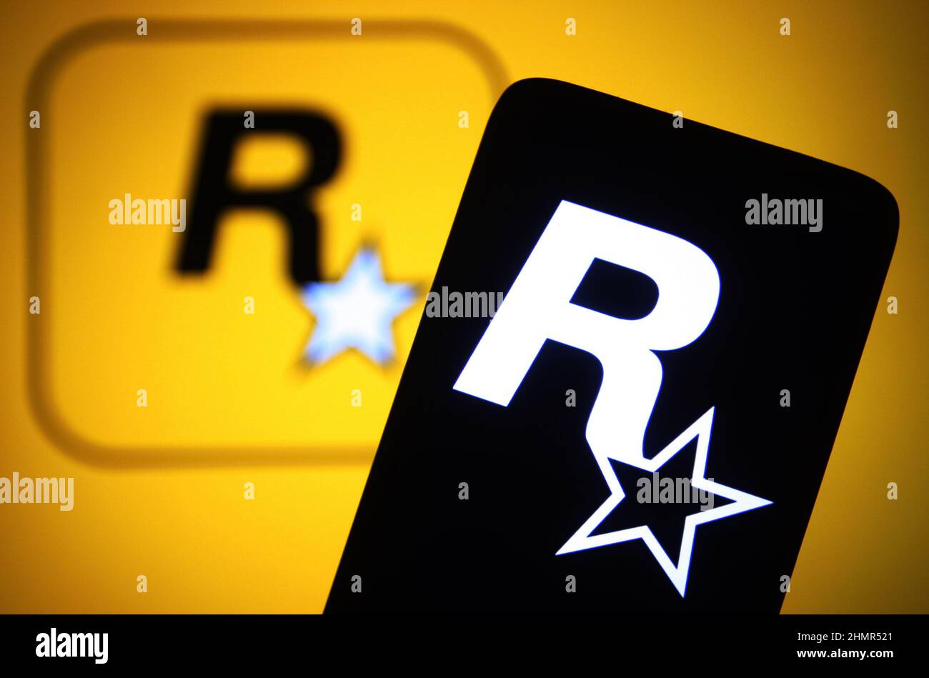 In this photo illustration, a Rockstar Games Inc logo of a video game  publisher is seen on a smartphone and a computer screen. (Photo by Pavlo  Gonchar / SOPA Images/Sipa USA Stock