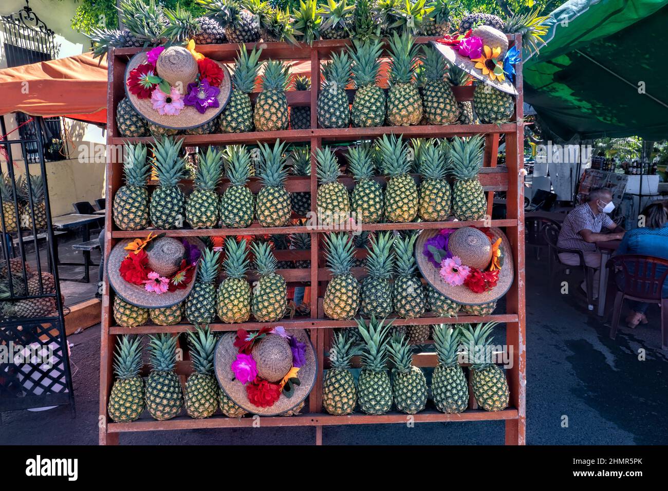 Food stall for piña loca rum, pineapple, and cream drink at the Food