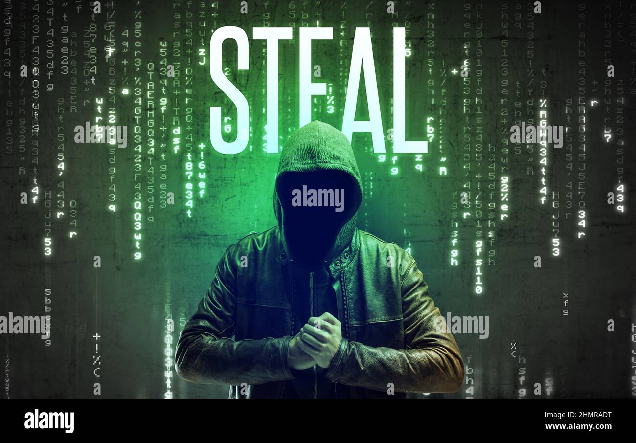 Faceless hacker with inscription Stock Photo