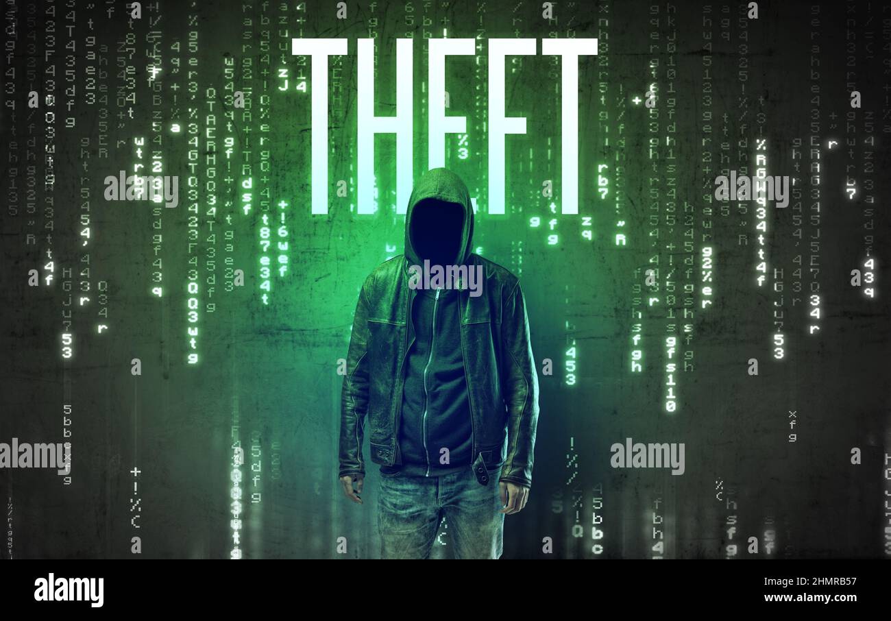 Faceless hacker with inscription Stock Photo