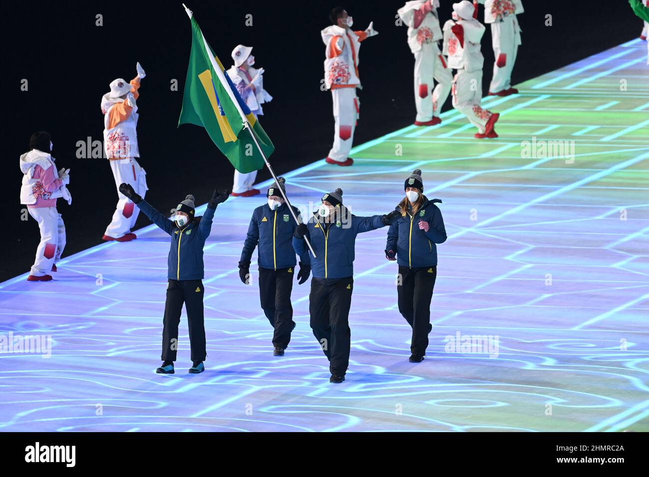 (220212) -- ZHANGJIAKOU, Feb. 12, 2022 (Xinhua) -- File photo shows Jaqueline Mourao (1st L, front) of Brazil during the opening ceremony of Beijing 2022 Winter Olympics in Beijing, capital of China, Feb. 4, 2022. Setting foot again in Beijing where she competed in mountain biking in 2008, Jaqueline Mourao created history as the first Brazilian athlete to compete at the Olympic Games eight times since her Olympic debut at Athens 2004, and she's also the first Brazilian woman athlete competed at both summer and winter Olympics.'In 2008, I wasn't a very mature athlete, mentally,' Mourao said. 'T Stock Photo
