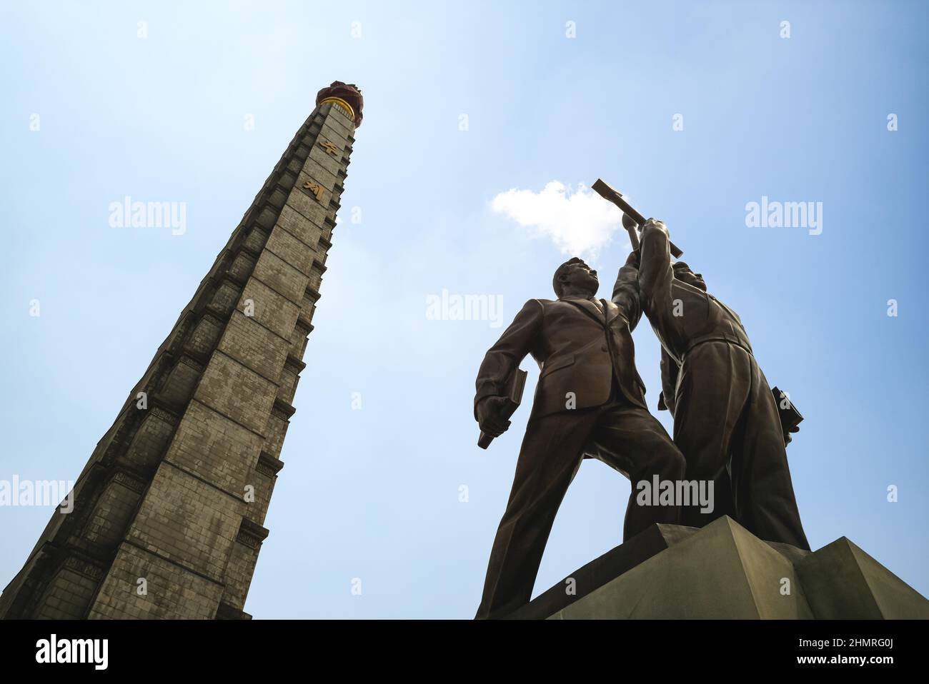 April 29, 2019: Up close view of the Juche Tower and the accompanying monument to the Workers Party of Korea located in Pyongyang, the capital of Nort Stock Photo