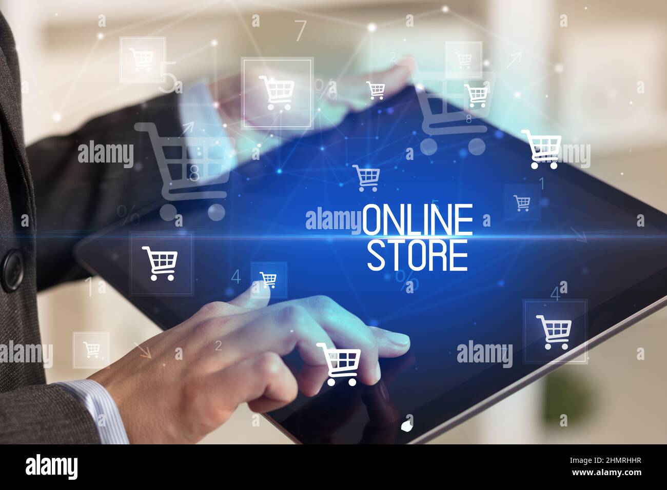 Young person makes a purchase through a tablet Stock Photo Alamy