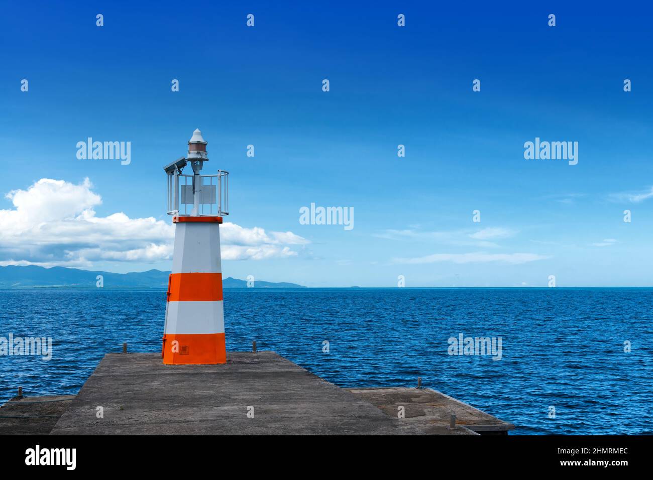 Lighthouse in 'Petit Canal' bay, Guadeloupe, French West Indies, blue sky and sea background Stock Photo