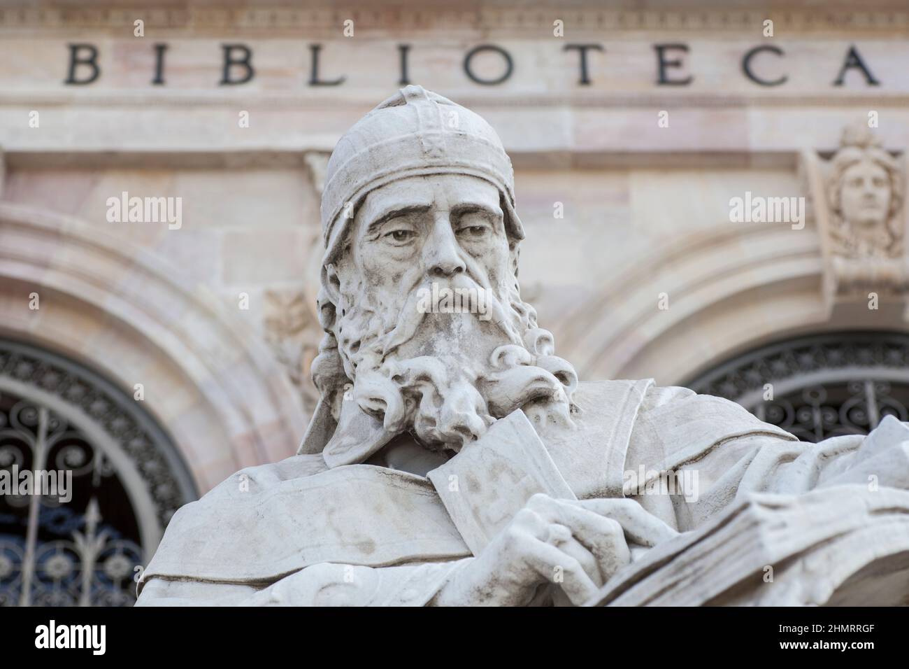 Madrid, Spain - March 6th, 2021: Isidore of Seville statue at National Library of Spain, Madrid. Medieval Spanish scholar Stock Photo