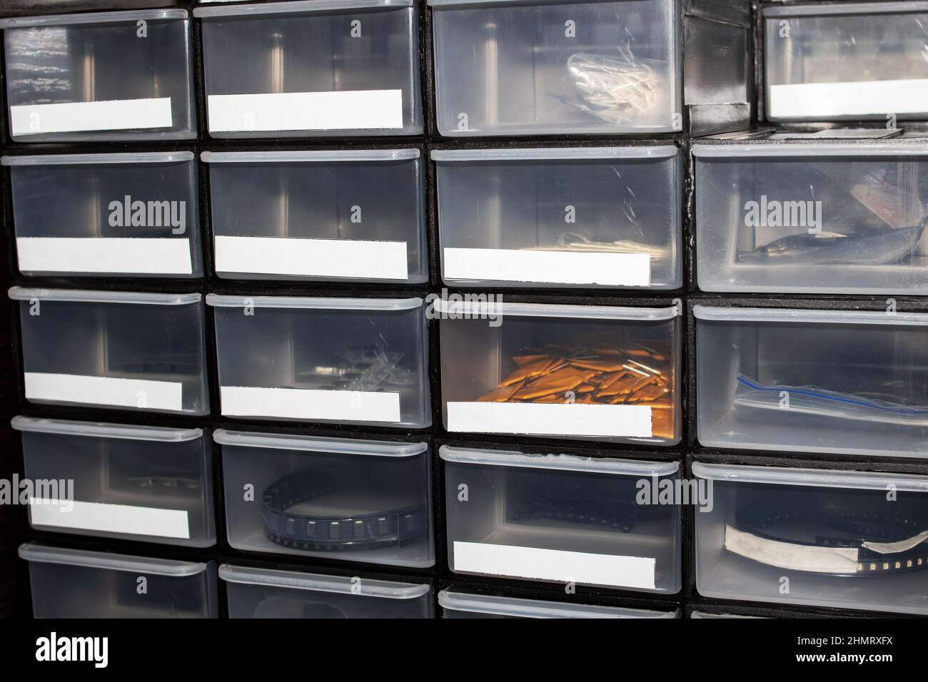 Plastic containers for storing small parts close up Stock Photo Alamy