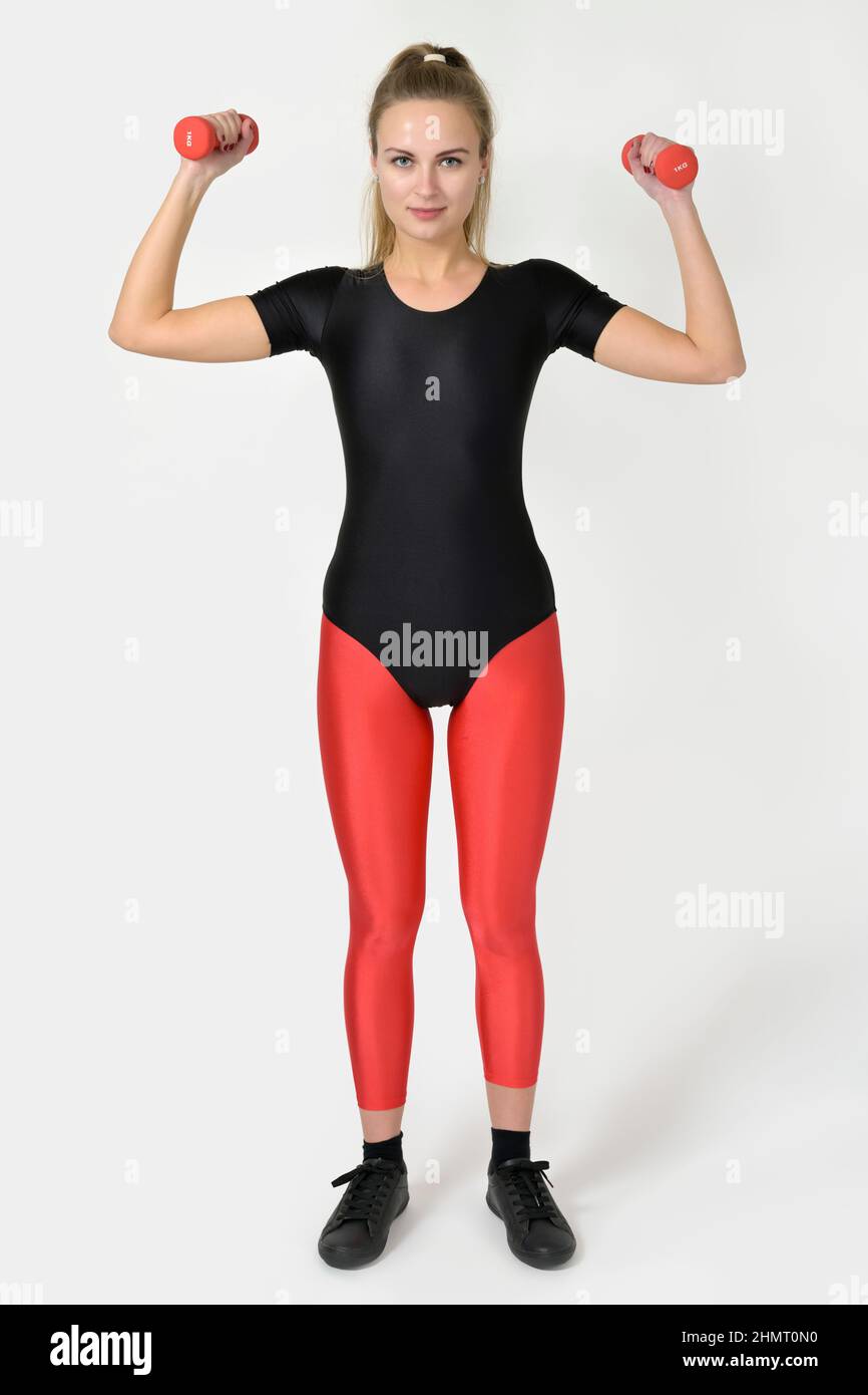 Young woman doing gymnastics, wearing a gym leotard and tights Stock Photo  - Alamy