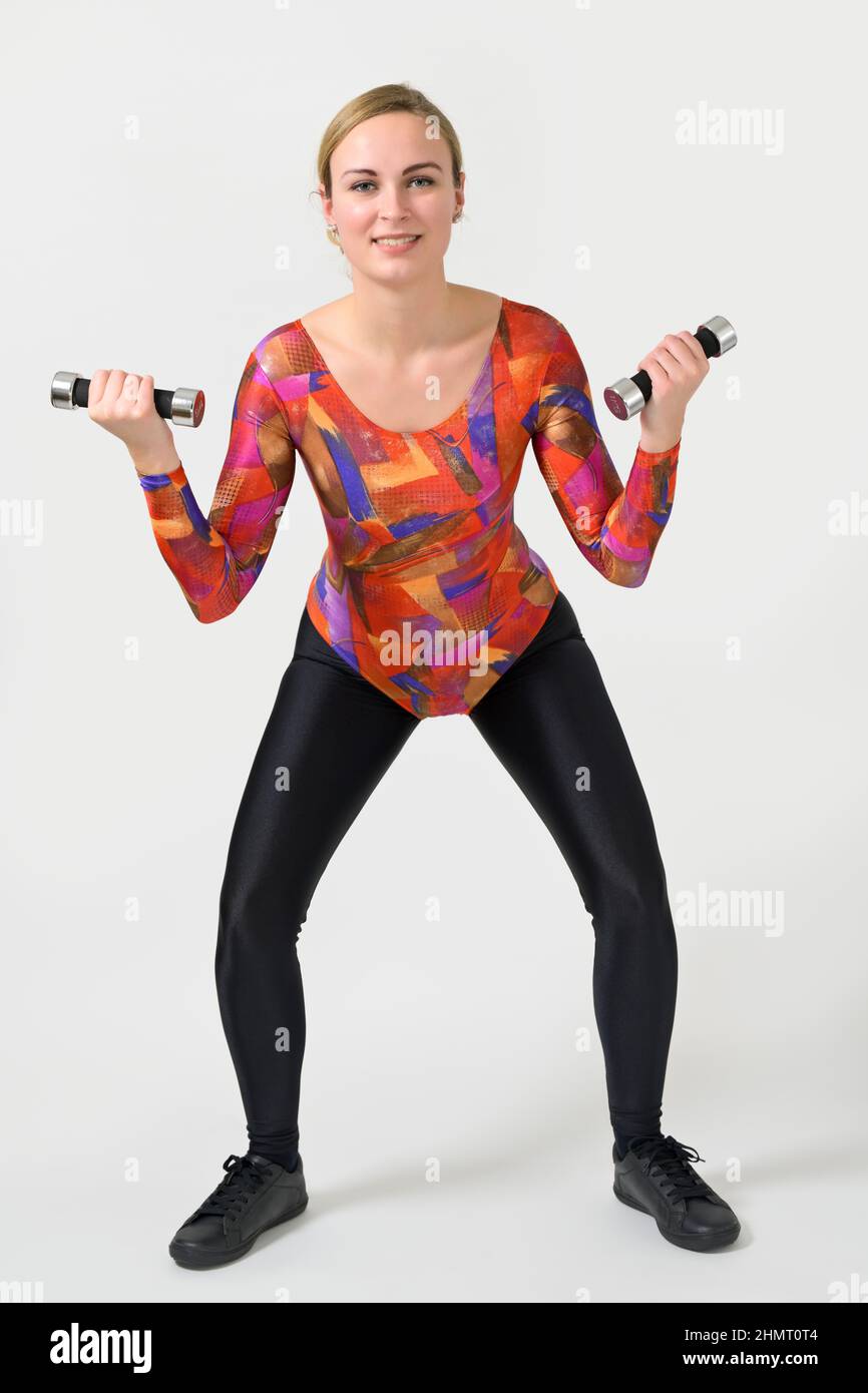 Woman wearing a shiny spandex leaotard and leggings, sports wear of the 80s/90s  Stock Photo - Alamy