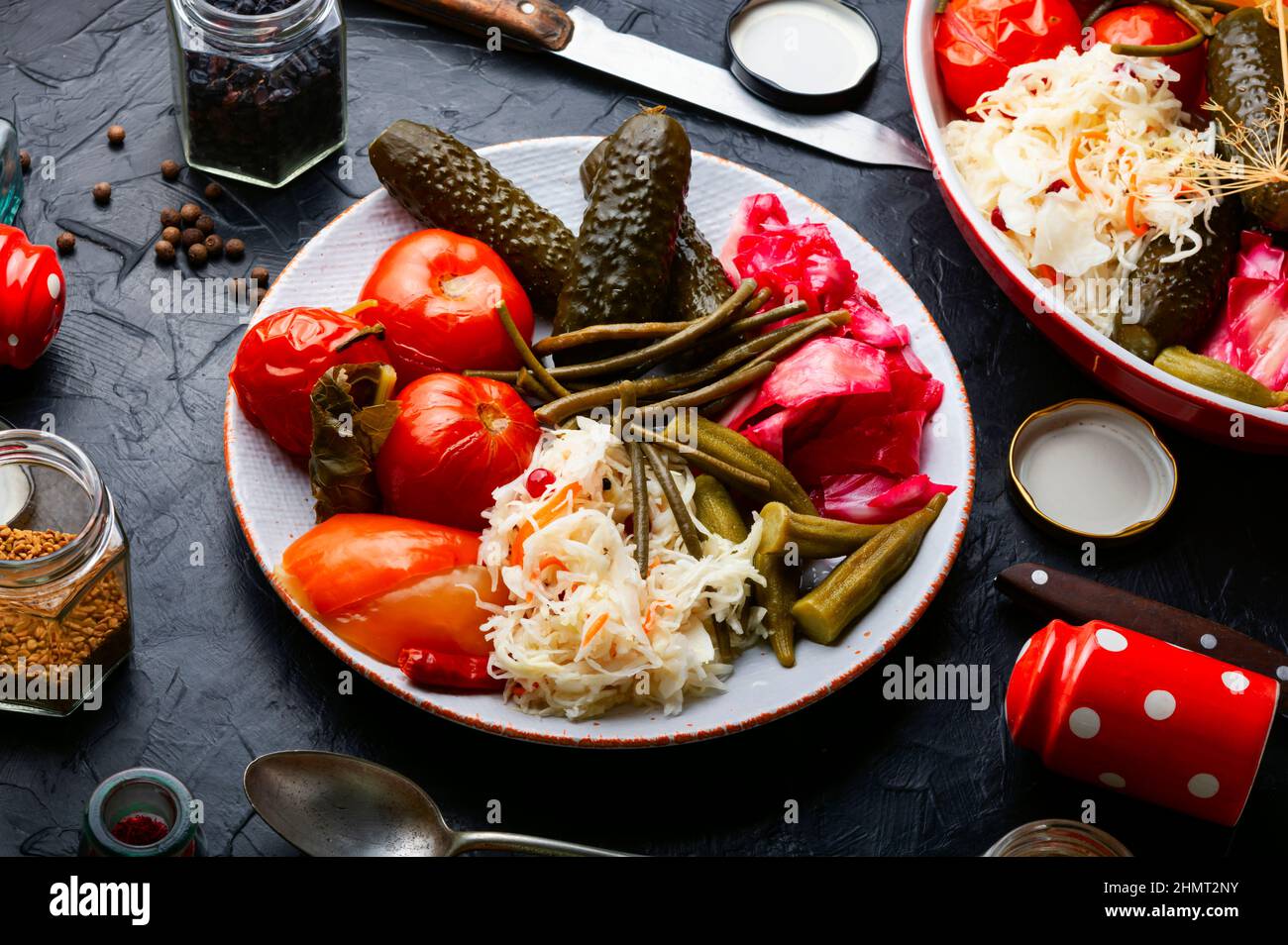 Set of pickles from tomato, sauerkraut, okra, cucumbers and cowpea