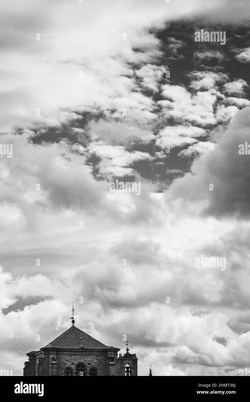 Black and white shot of a church under the cloudy sky Stock Photo - Alamy