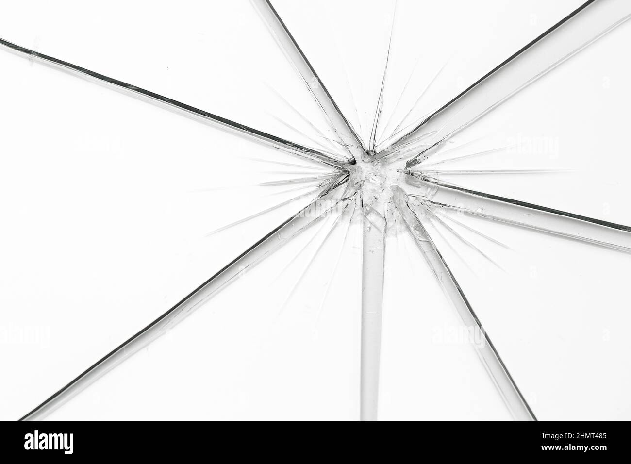 Broken window glass crack splitter on white gray background Stock Photo