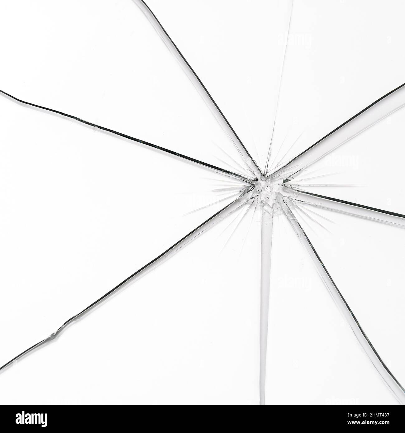 Broken window glass crack splitter on white gray background Stock Photo
