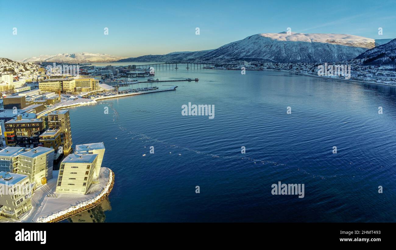 NORWAY, TROMSO - JANUARY 25, 2022 - Aerial photo over Tromso during winte with snow Stock Photo