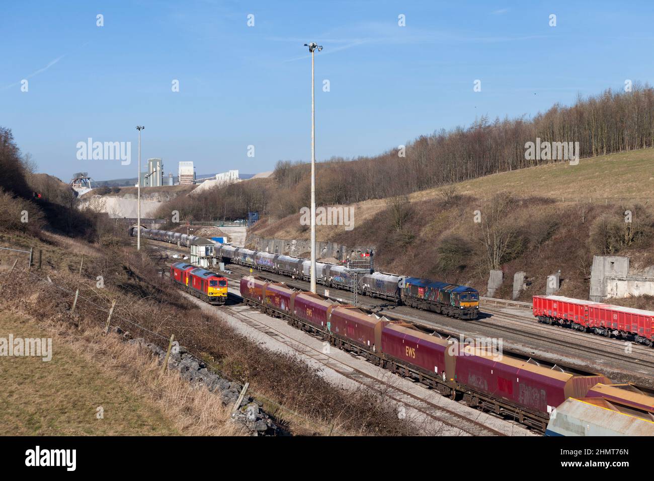 GB Railfreight class 66 locomotive and DB cargo class 60 locomotives with freight trains at Peak Forest in the Derbyshire peak district Stock Photo