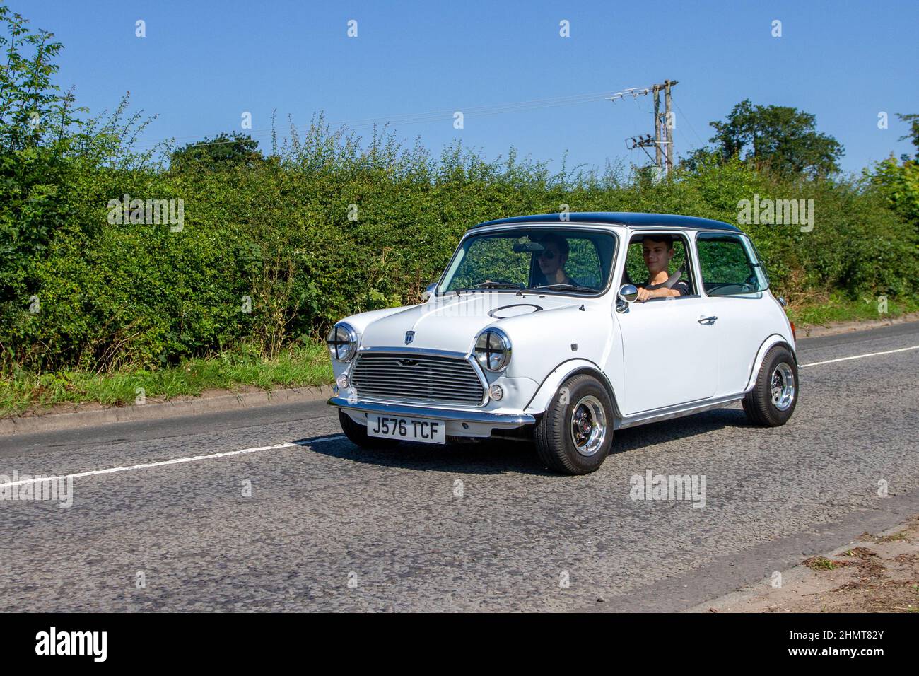 1991 90s nineties white  Rover Mini City E 998cc 4 speed manual; en-route to Capesthorne Hall classic July car show, Cheshire, UK Stock Photo