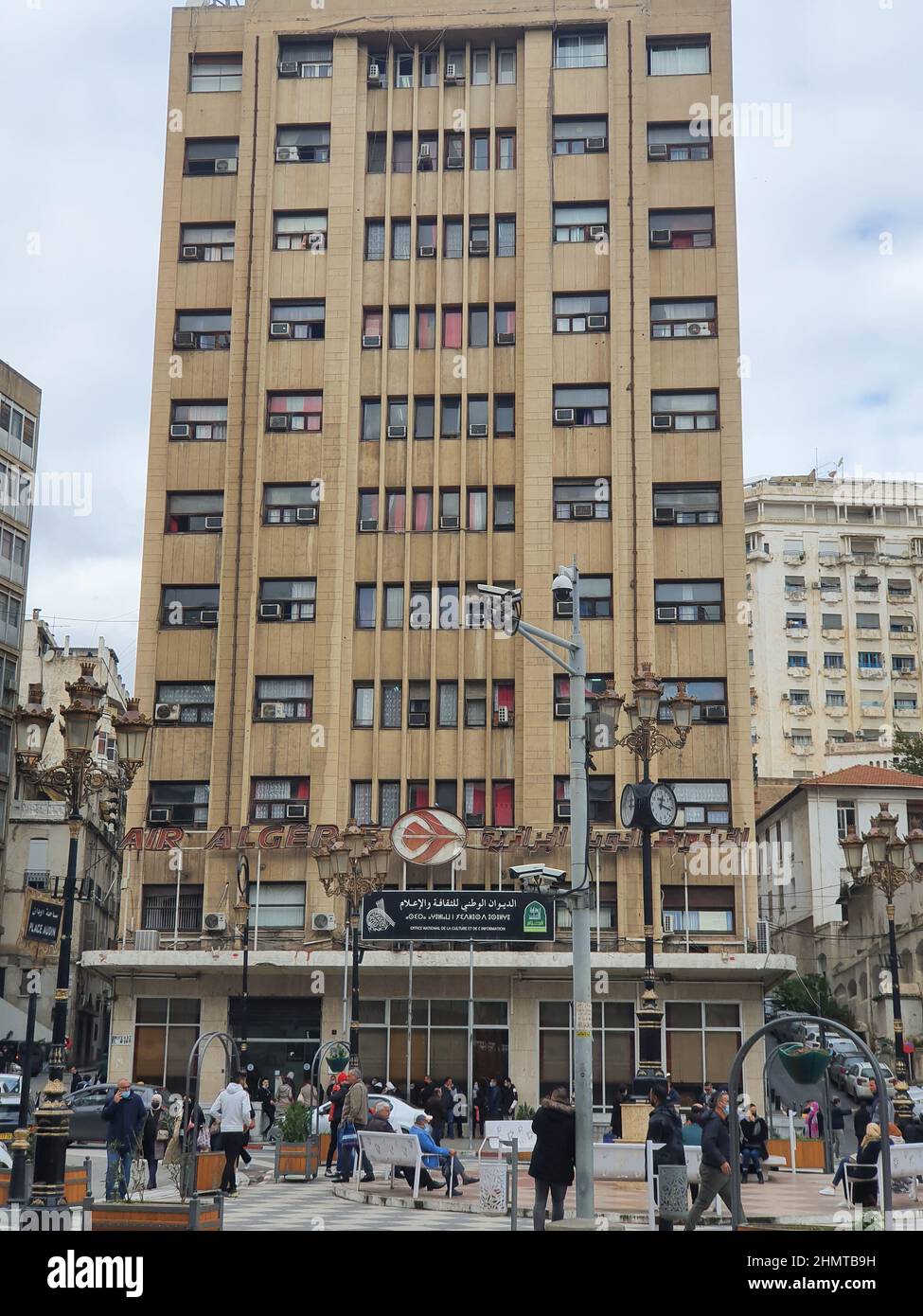 Air Algérie airl ines company main branch and the National Office of Culture and Information ONCI in Algiers. People walking and waiting in queue. Stock Photo