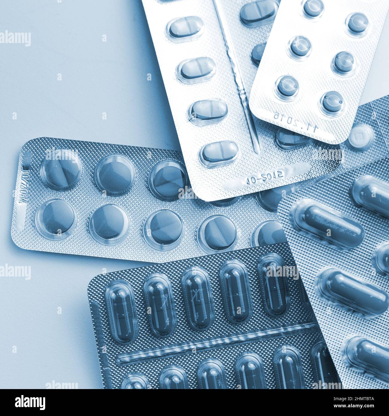 Tablets capsule pills heap in Blister packagings antibiotic pharmacy medicine medical flu Stock