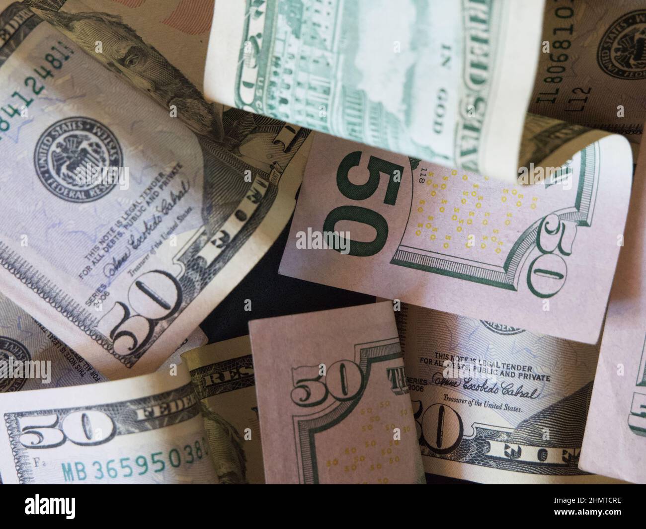 Banknotes with a face value of 50 dollars closeup. American paper