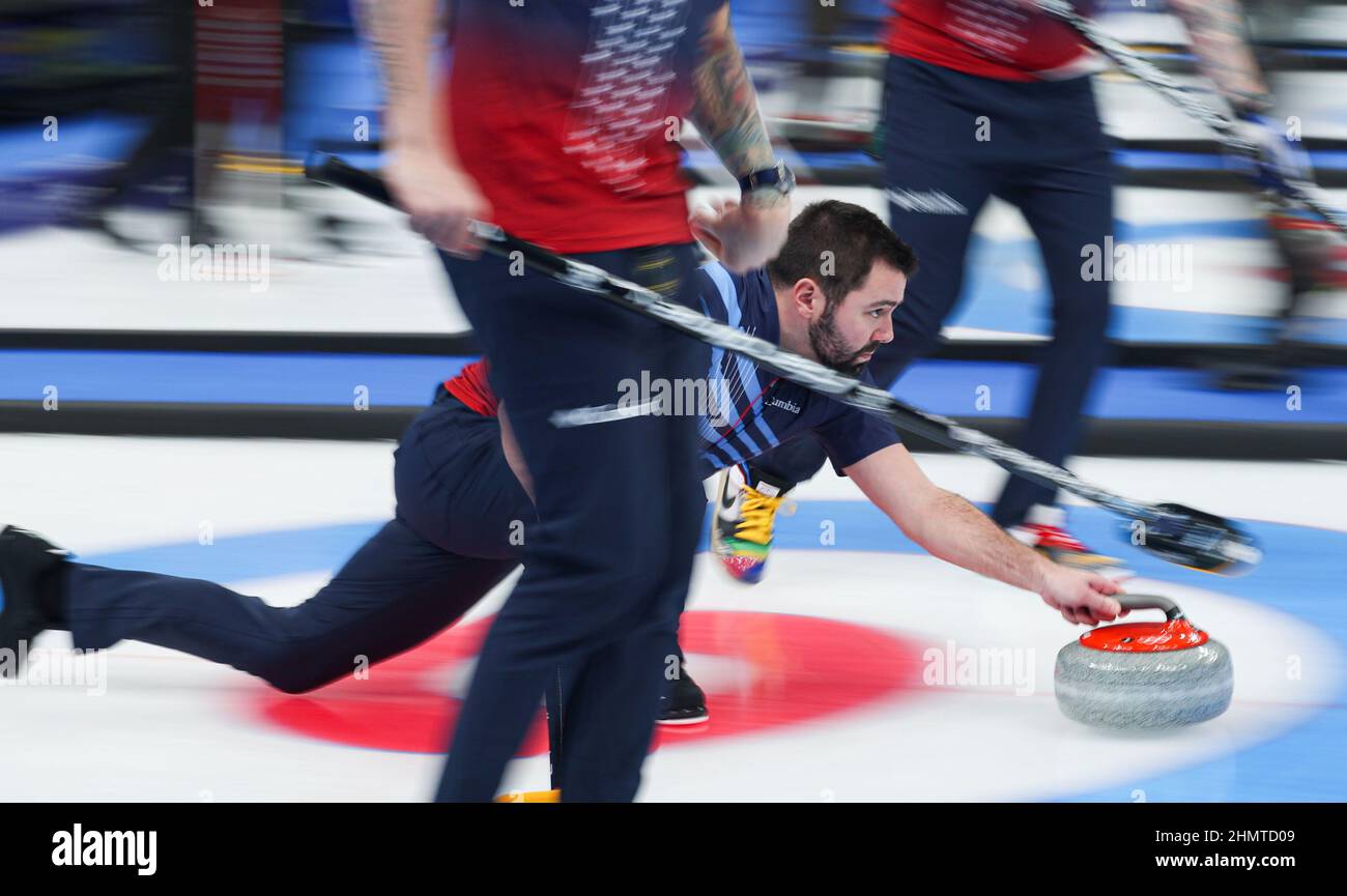 Beijing, China. 12th Feb, 2022. John Landsteiner of the United States competes during the Curling Men's Round Robin Session 5 of the Beijing 2022 Winter Olympics between Italy and China at the National Aquatics Centre in Beijing, capital of China, Feb. 12, 2022. Credit: Wang Jingqiang/Xinhua/Alamy Live News Stock Photo