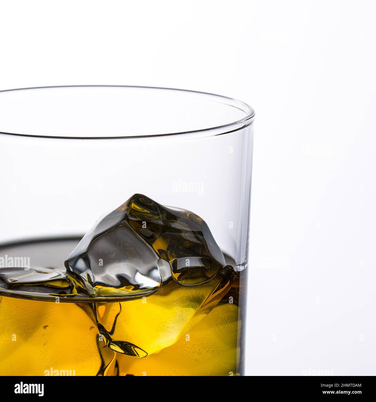 whiskey with ice on white Stock Photo Alamy