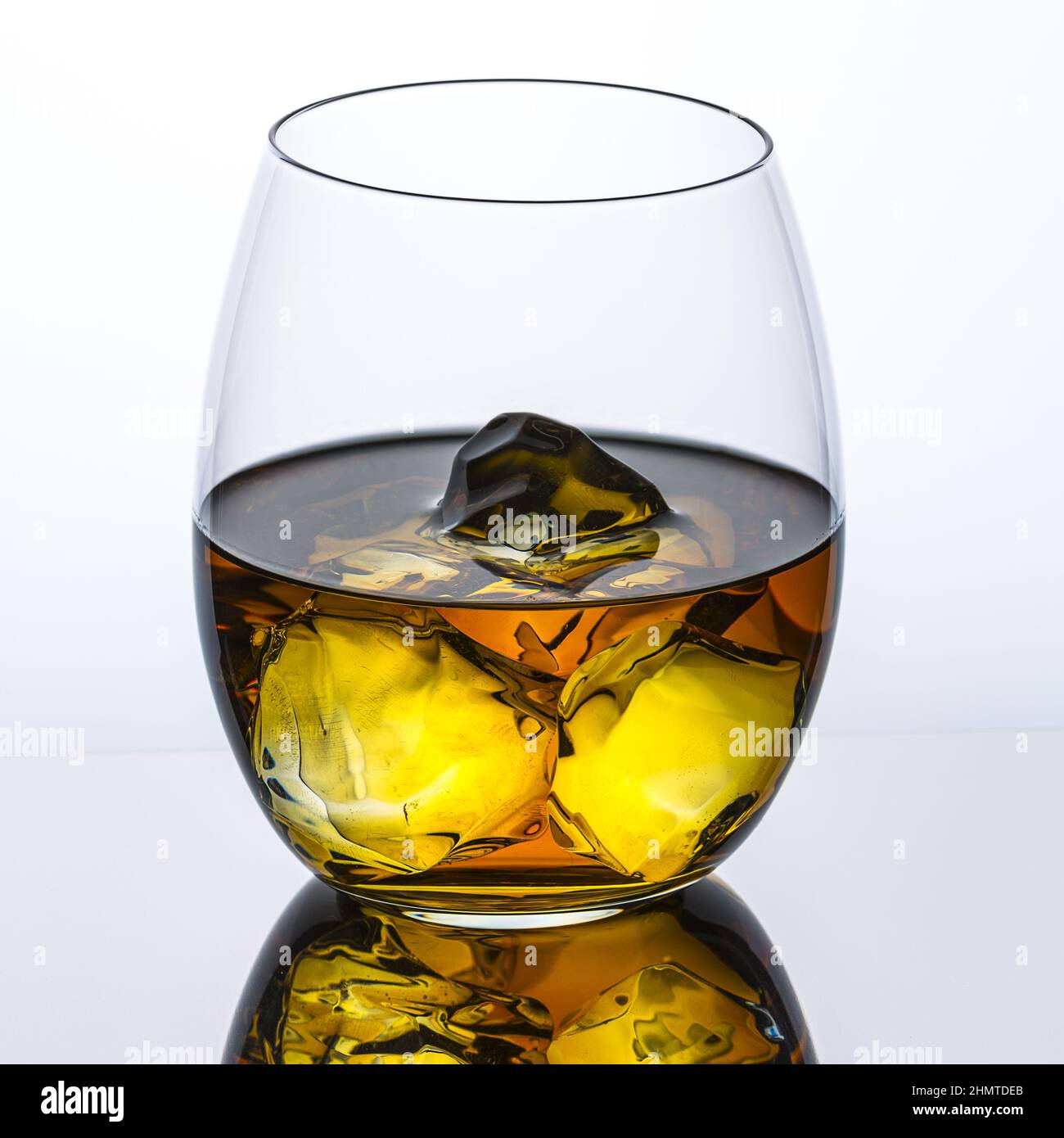bourbon Whisky with chunks of ice Stock Photo
