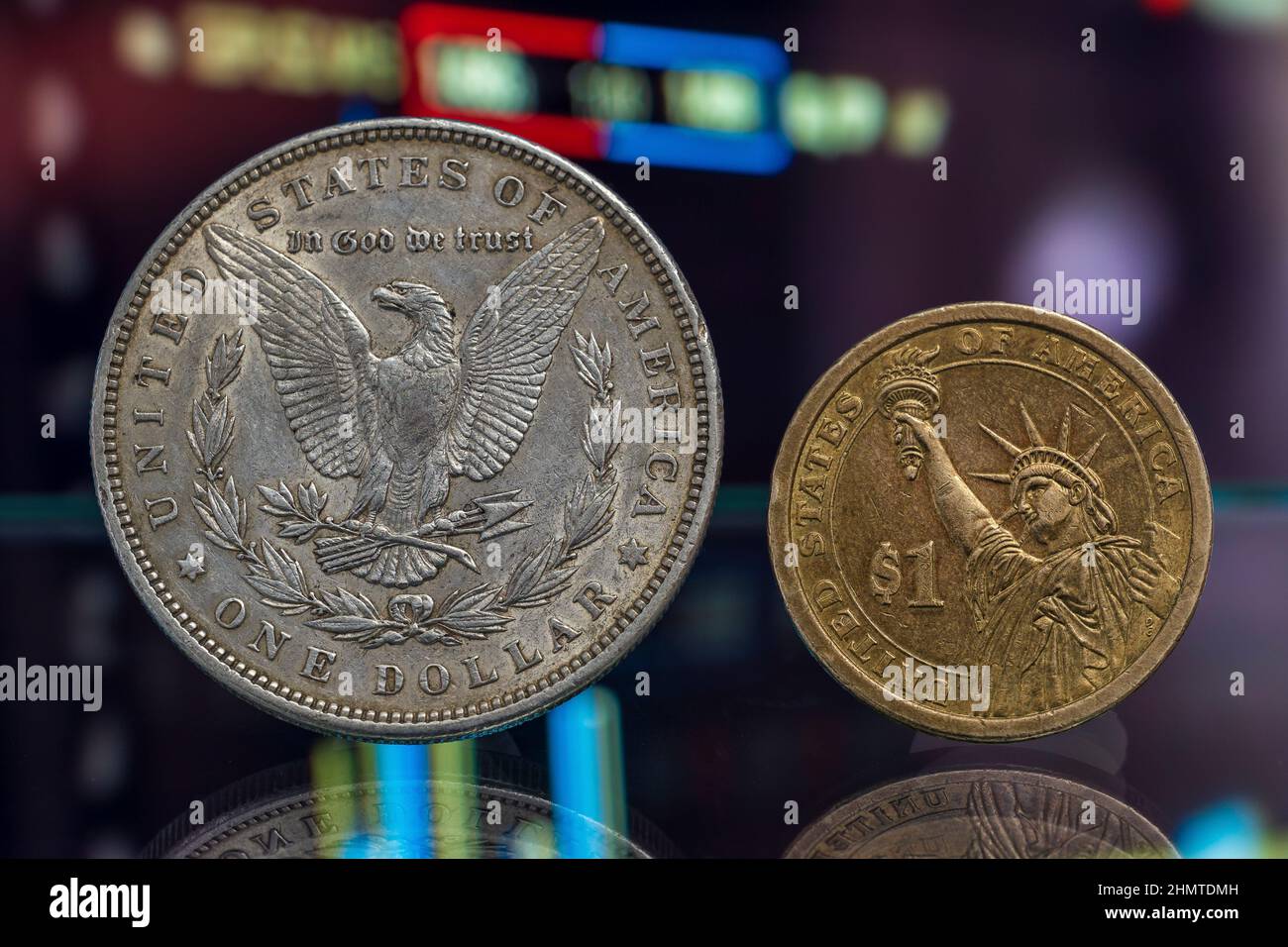 Money and Inflation Conceptual Morgan Dollar versus Current Dollar Side by Side Graphic Background Stock Photo