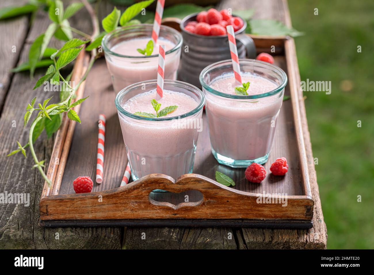 Sweet cocktail made of yoghurt and raspberries. Raspberry smoothie made