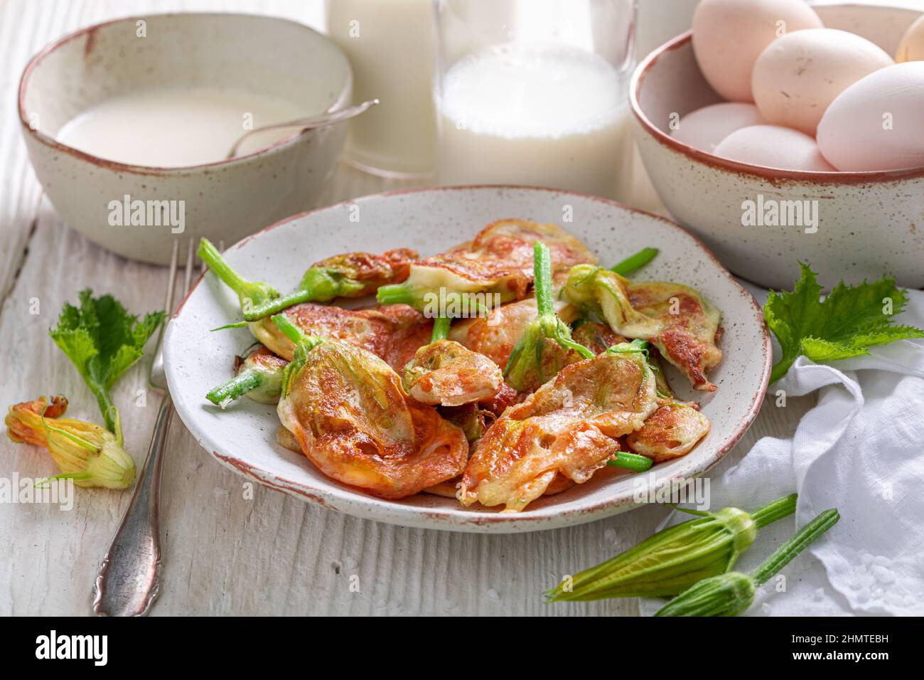 Healthy roasted pumpkin flower made of pancake batter. Deep fried