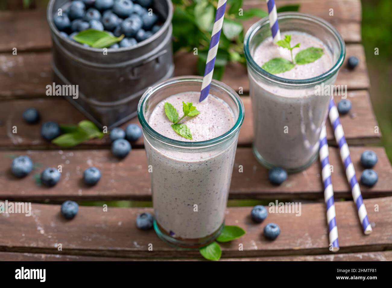 Sweet cocktail made of blueberries and yoghurt. Blueberries smoothie ...