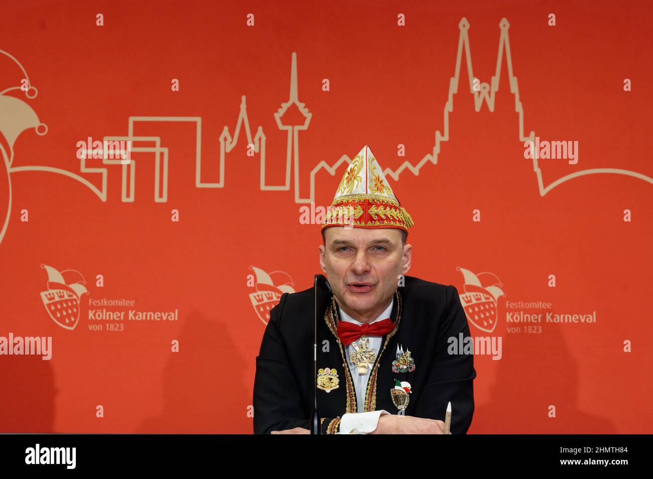 Cologne, Germany. 12th Feb, 2022. Train manager Holger Kirsch sits on the podium at a press conference on the schedule for the Shrove Monday procession. Persiflage floats of the Cologne Shrove Monday procession are to pass through the soccer stadium in front of 8800 spectators. Credit: Henning Kaiser/dpa/Alamy Live News Stock Photo
