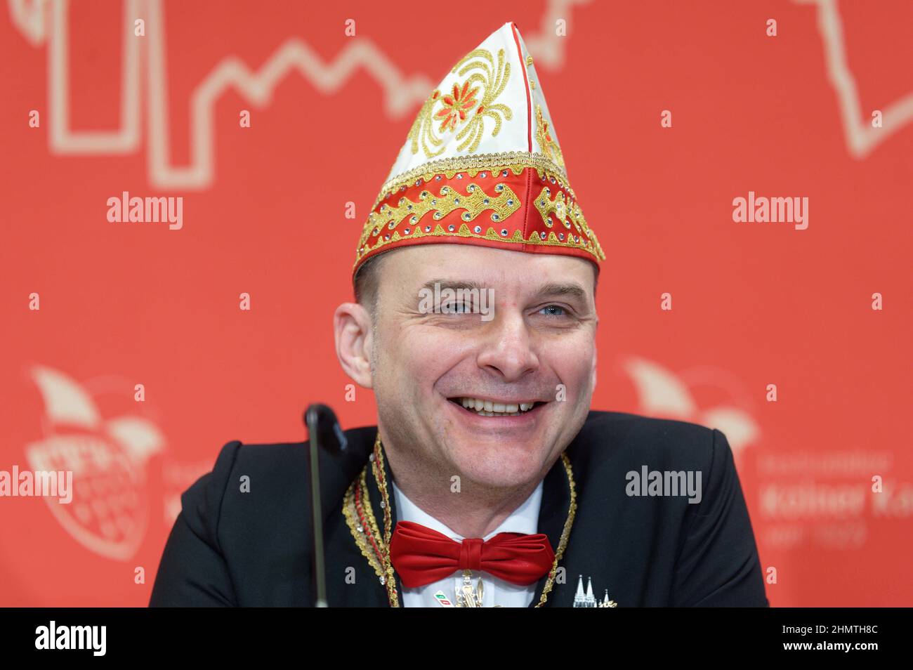 Cologne, Germany. 12th Feb, 2022. Train manager Holger Kirsch sits on the podium at a press conference on the schedule for the Shrove Monday procession. Persiflage floats of the Cologne Shrove Monday procession are to pass through the soccer stadium in front of 8800 spectators. Credit: Henning Kaiser/dpa/Alamy Live News Stock Photo