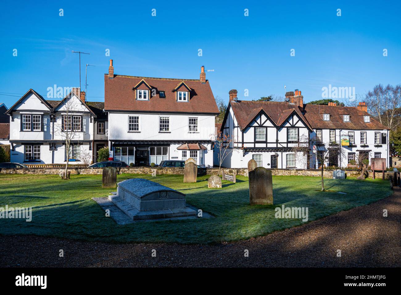 The pretty village of Mickleham in Surrey viewed from the churchyard, England, UK, on a sunny winter day with blue sky Stock Photo