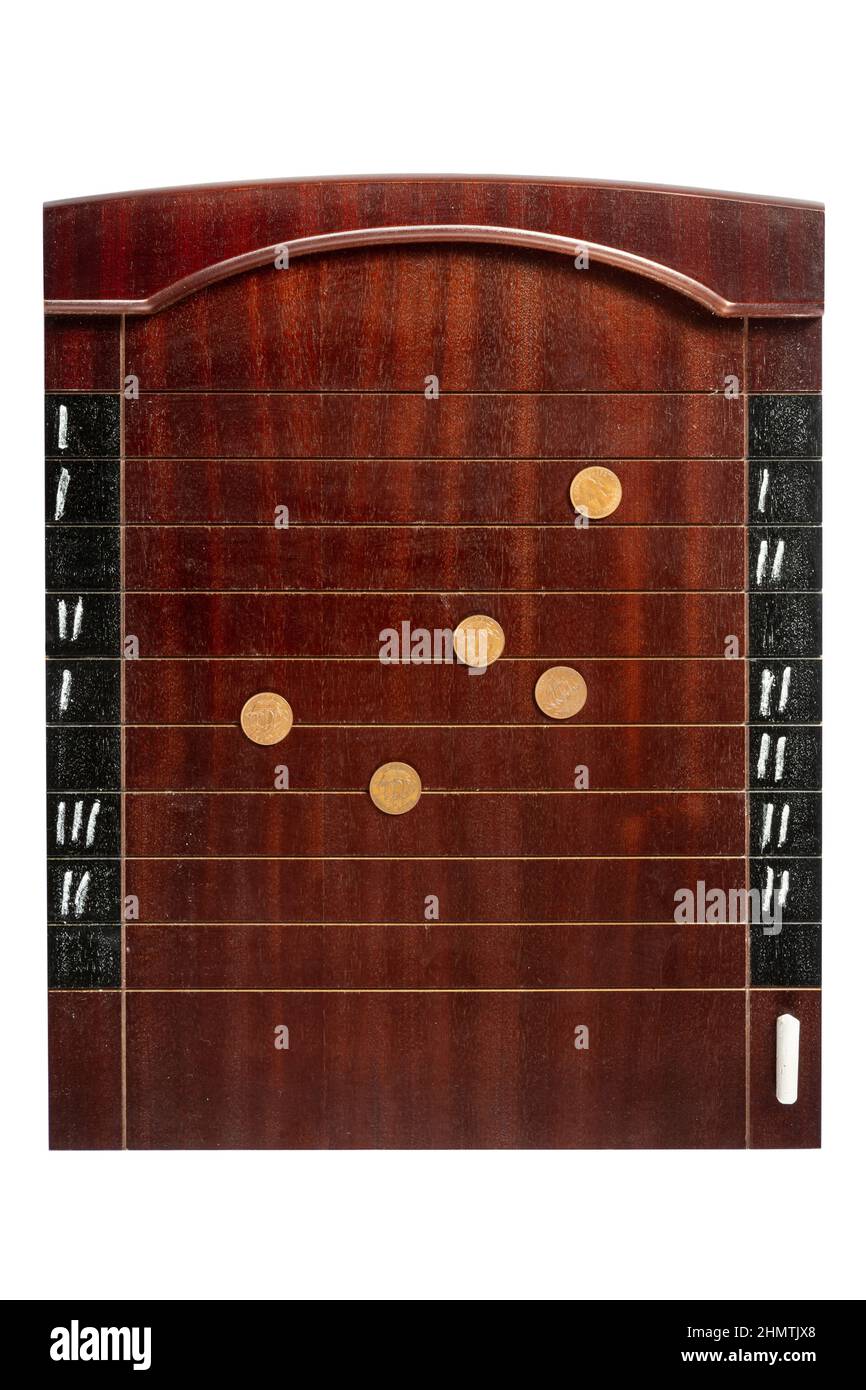Shove ha'penny vintage board game, shove halfpenny traditional pub game, UK Stock Photo