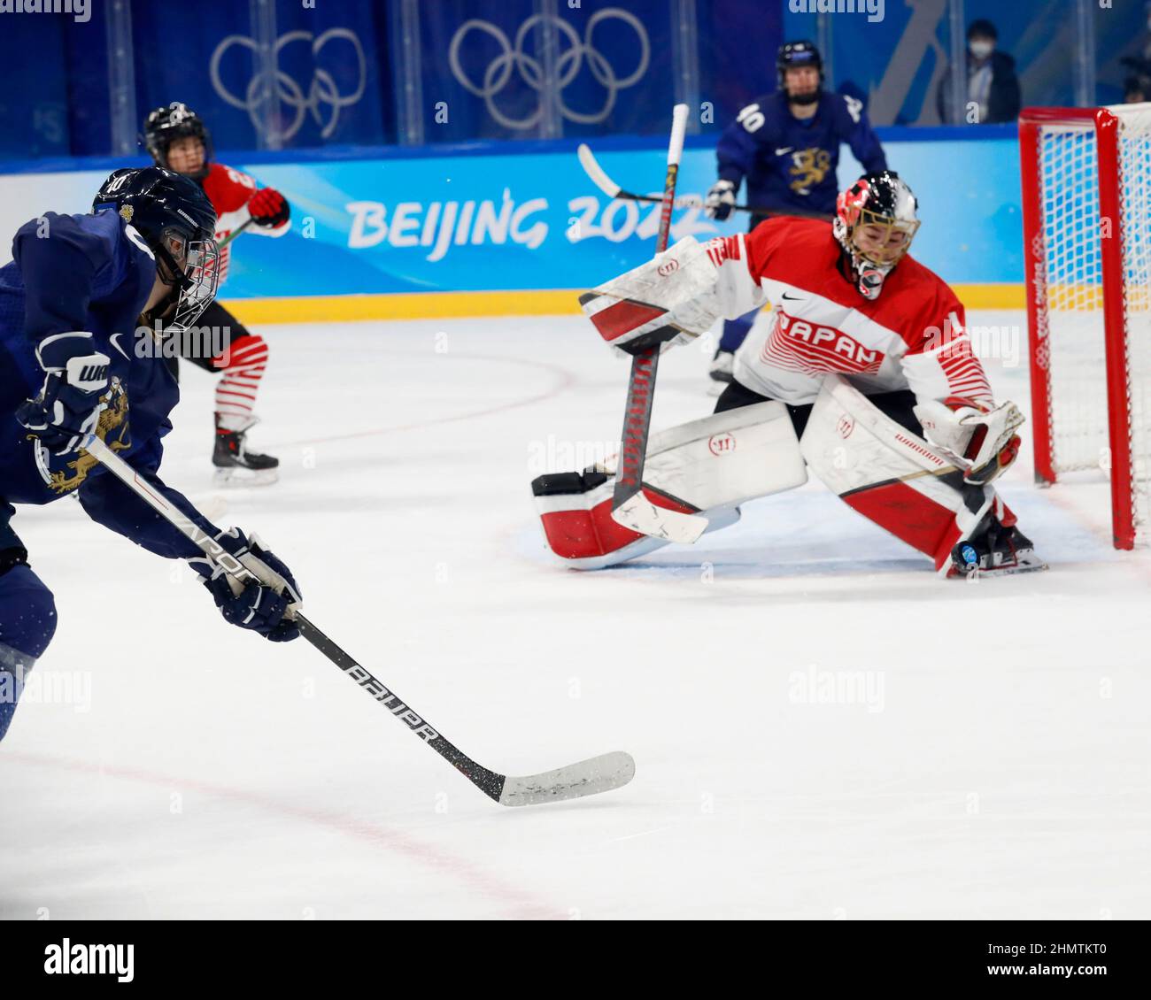 Beijing, Hebei, China. 12th Feb, 2022. Team Finland forward Elisa Holopainen (10) shoots and has her shot blocked by Team Japan goalkeeper Nana Fujimoto (1) during the womenÃ¢â‚¬â„¢s ice hockey quarterfinal during the Beijing 2022 Olympic Winter Games at Wukesong Sports Centre. (Credit Image: © David G. McIntyre/ZUMA Press Wire) Credit: ZUMA Press, Inc./Alamy Live News Stock Photo