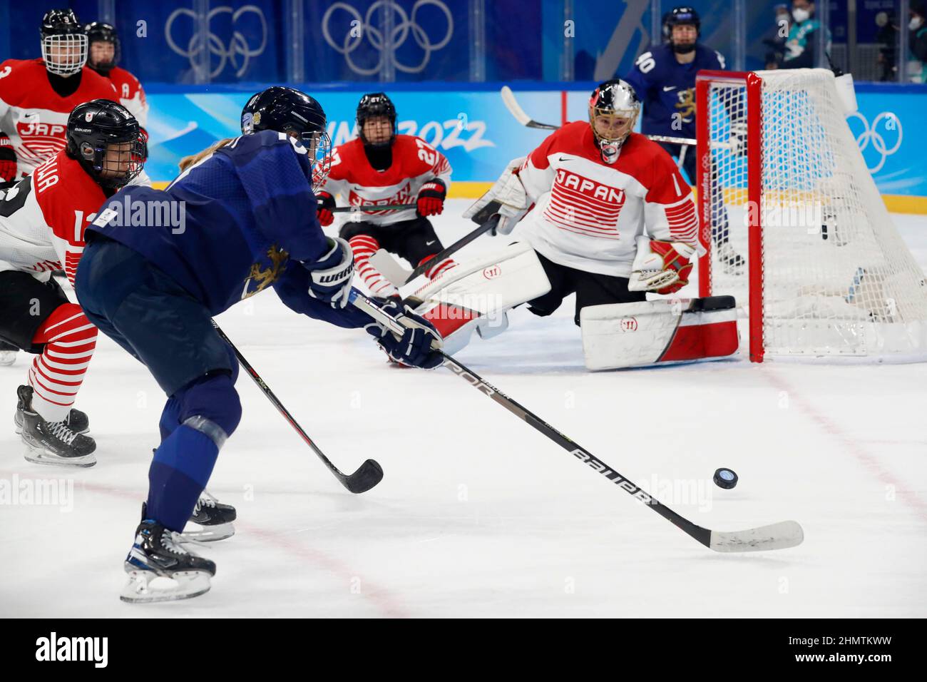 Beijing, Hebei, China. 12th Feb, 2022. Team Finland forward Elisa Holopainen (10) shoots and has her shot blocked by Team Japan goalkeeper Nana Fujimoto (1) during the women's ice hockey quarterfinal during the Beijing 2022 Olympic Winter Games at Wukesong Sports Centre. (Credit Image: © David G. McIntyre/ZUMA Press Wire) Credit: ZUMA Press, Inc./Alamy Live News Stock Photo