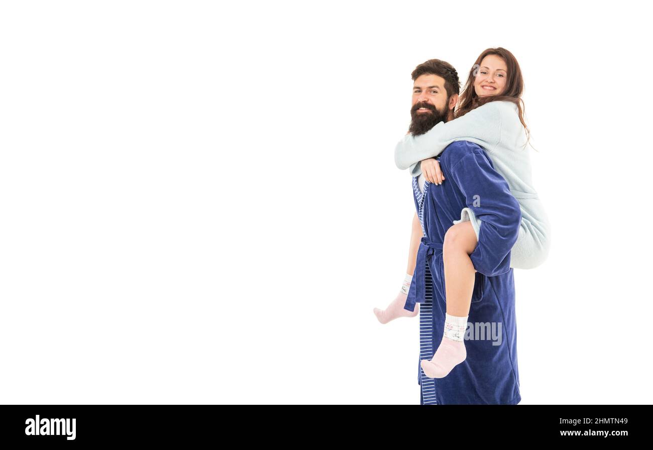 Happy girl ride piggyback on man in morning isolated on white copy space, relationship Stock Photo