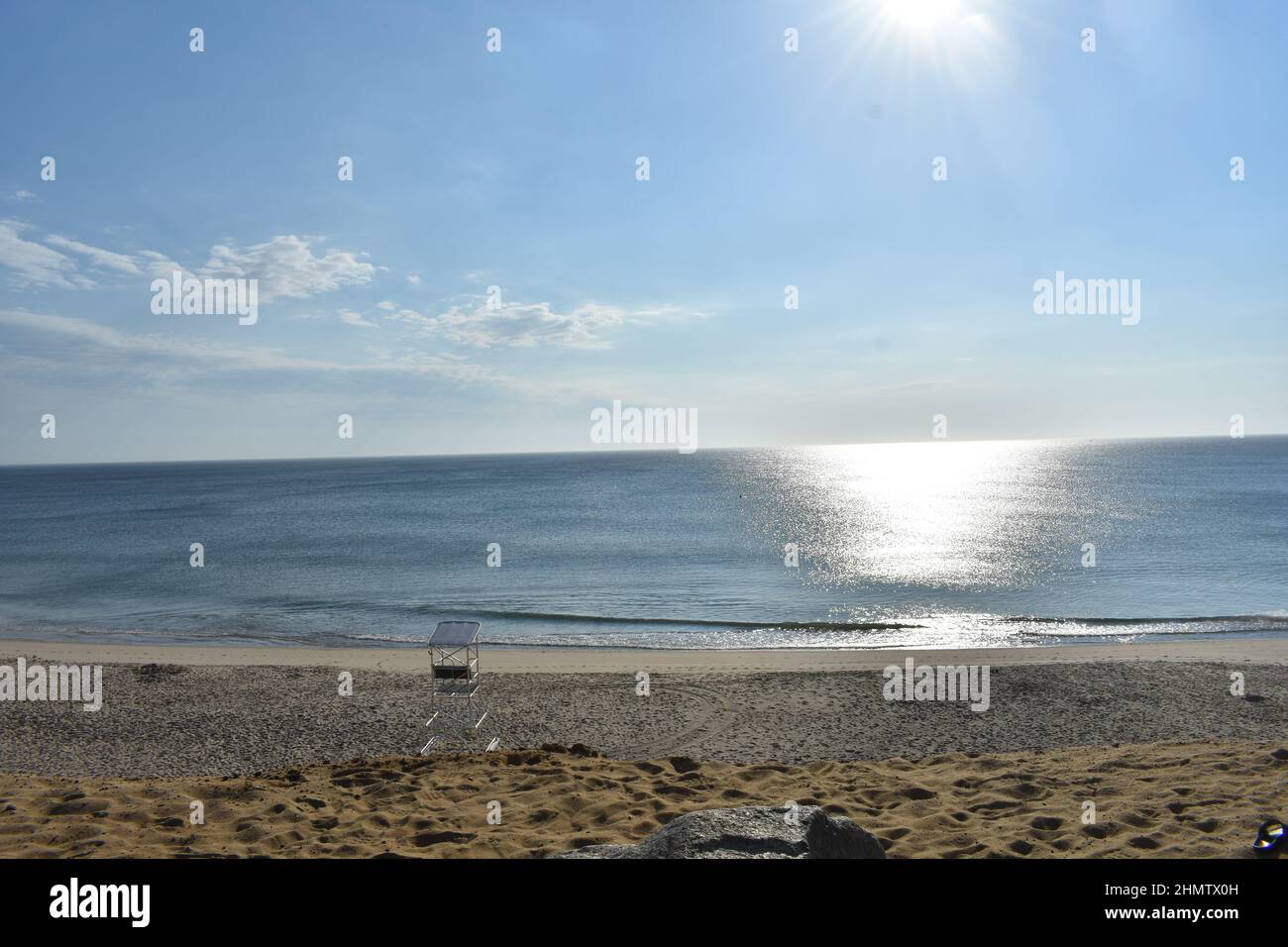 Summer morning sun on a quiet ocean in Truro Massachusetts Stock Photo
