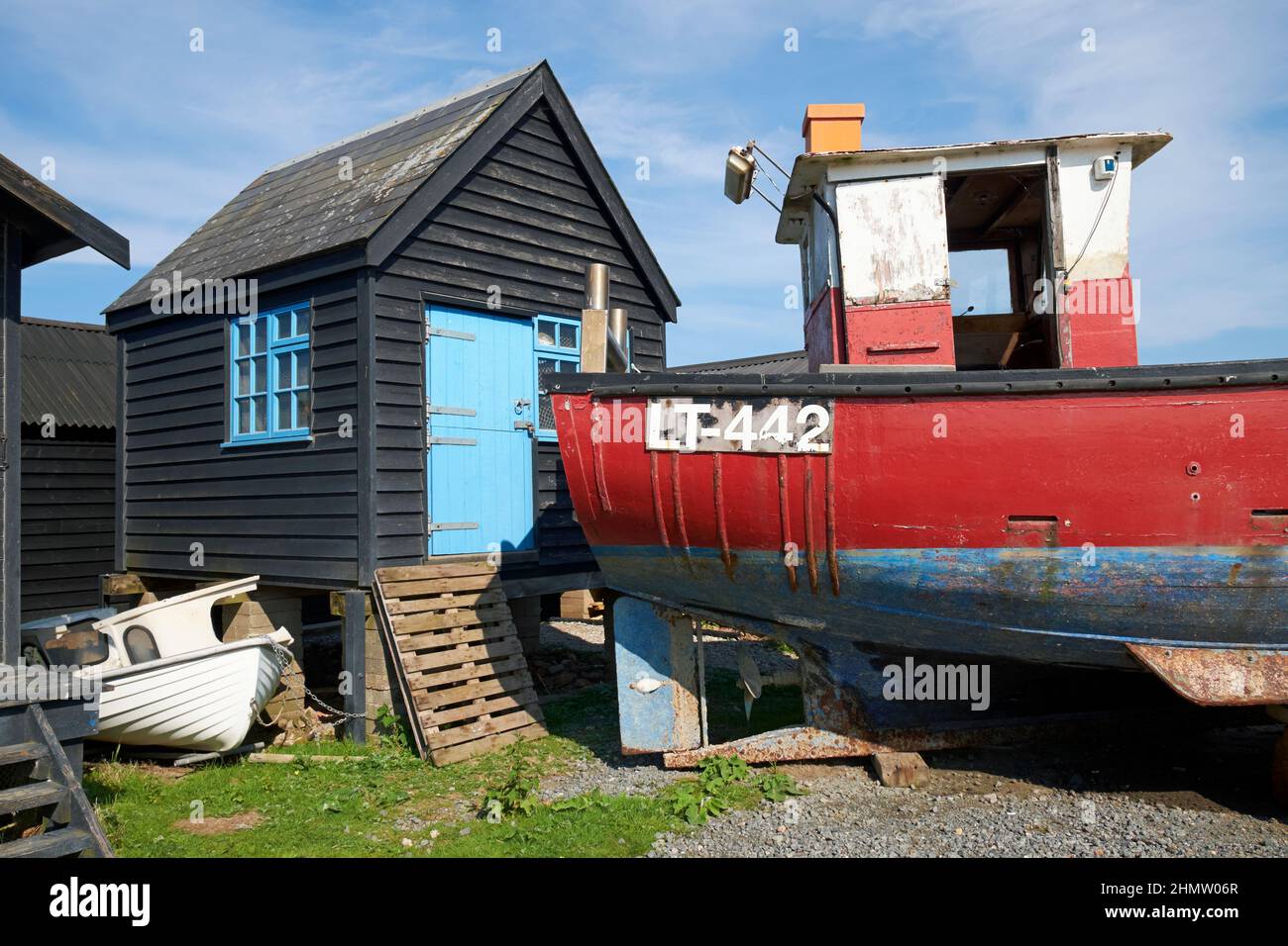 A fisherman's hut and old fishing boat at Southwold harbour, Suffolk, UK. Stock Photo
