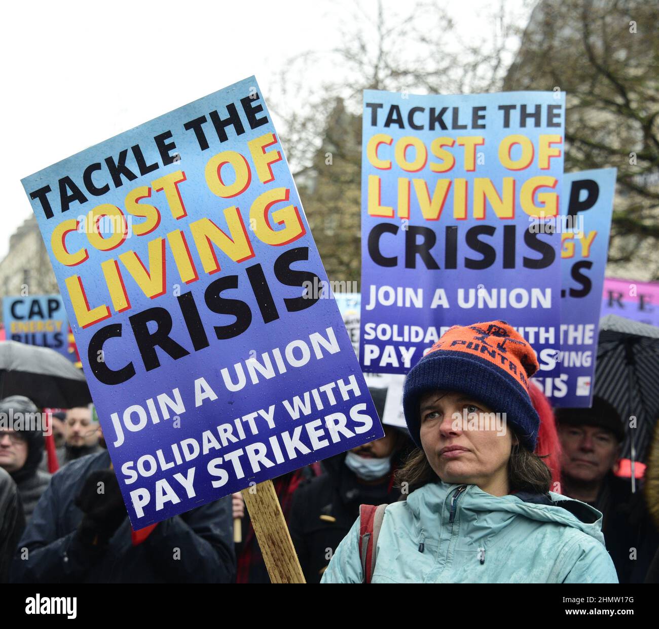 Manchester, UK, 12th February, 2022. Protest about high energy bills organised by Manchester Trades Council and Manchester People's Assembly - Austerity Cut it Out.  Protesters assembled in Piccadilly Gardens, central Manchester, UK, before marching through the city centre. Protests are also taking place in other cities in the UK. Organisers say: 'Fuel bills are due to rise by another 54% in April, at the same time that National Insurance goes up. RPI inflation is already 7.5%. Rents and interest rates are rising'. Credit: Terry Waller/Alamy Live News Stock Photo