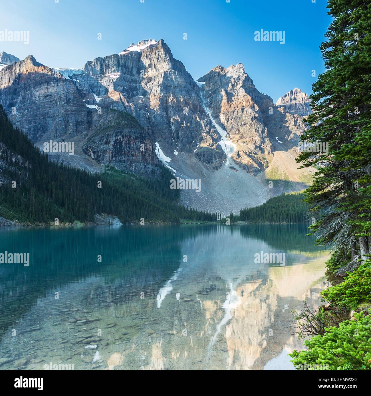 Moraine Lake in the morning at Sunrise in banff canada Stock Photo