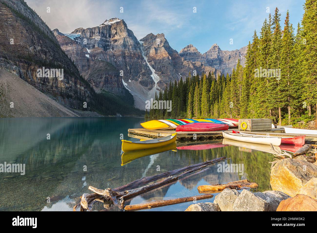 Moraine Lake and boat with snow capped mountain of Banff National Park in canada Stock Photo