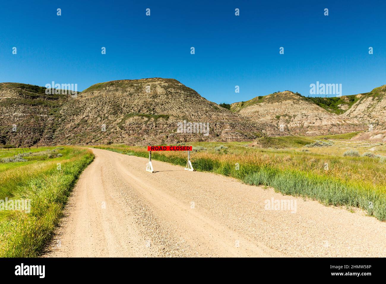 road closed at the drumheller badlands Stock Photo Alamy