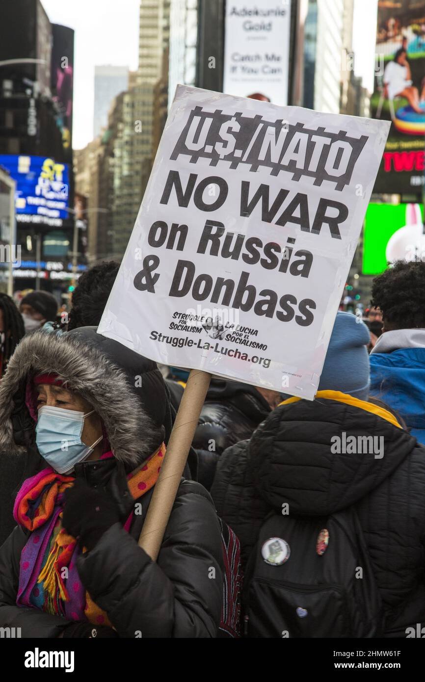 Demonstration against the rising American/NATO drumbeat of possible war with Russia, seemingly poised to invade Ukraine. A coalition of ant-war and peace groups converged in Times Square to speak out. Stock Photo